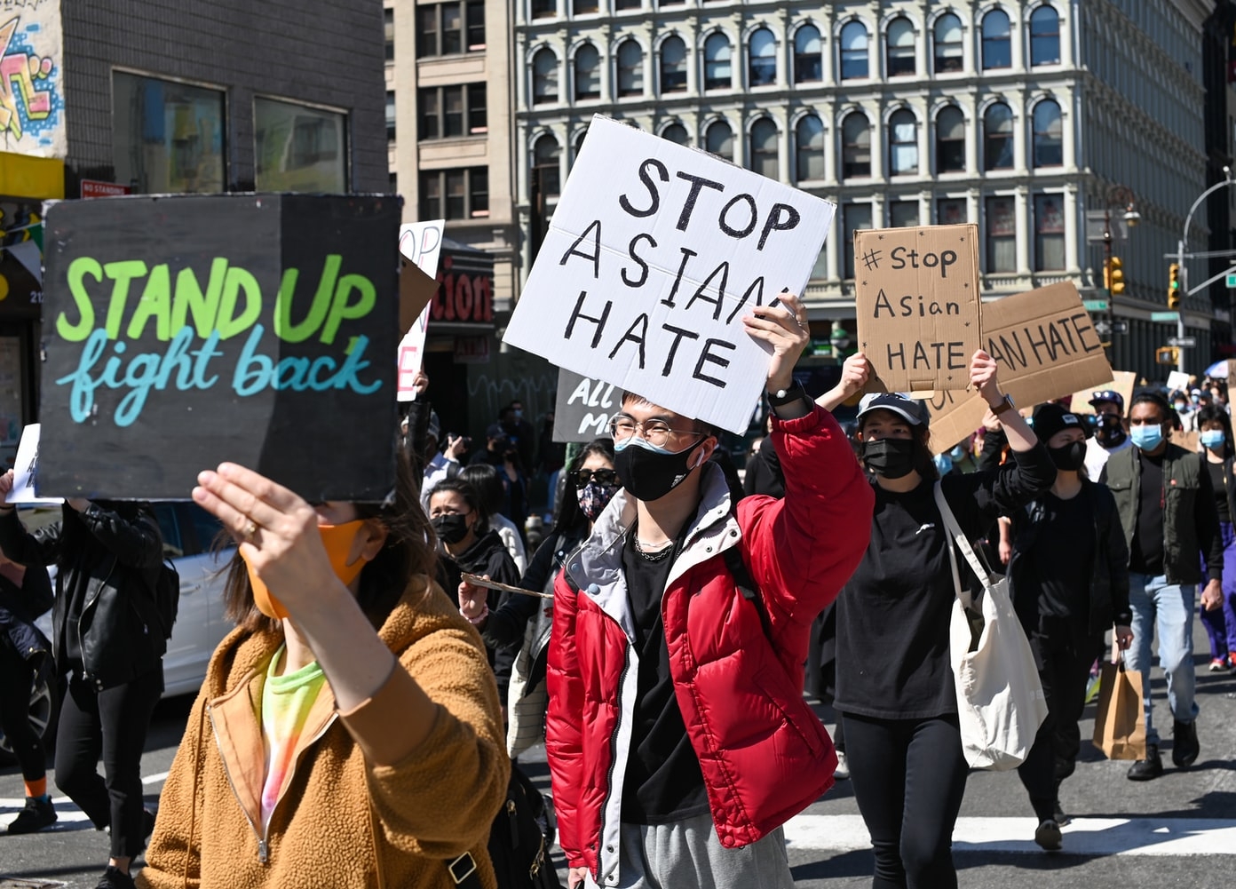 People marching against violence towards asian Americans in downtown Los Angeles